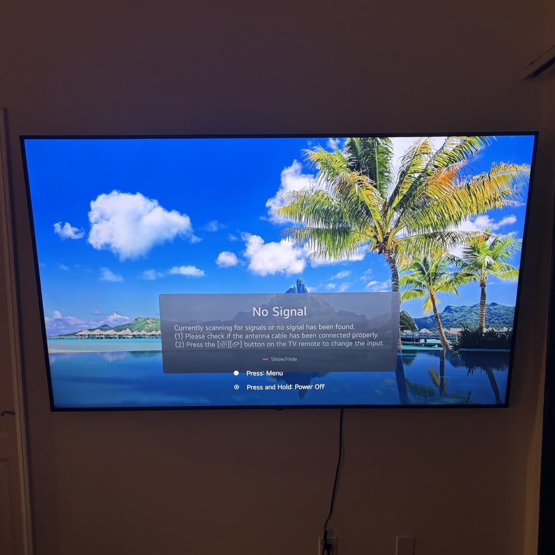 Large TV mounted on wall
