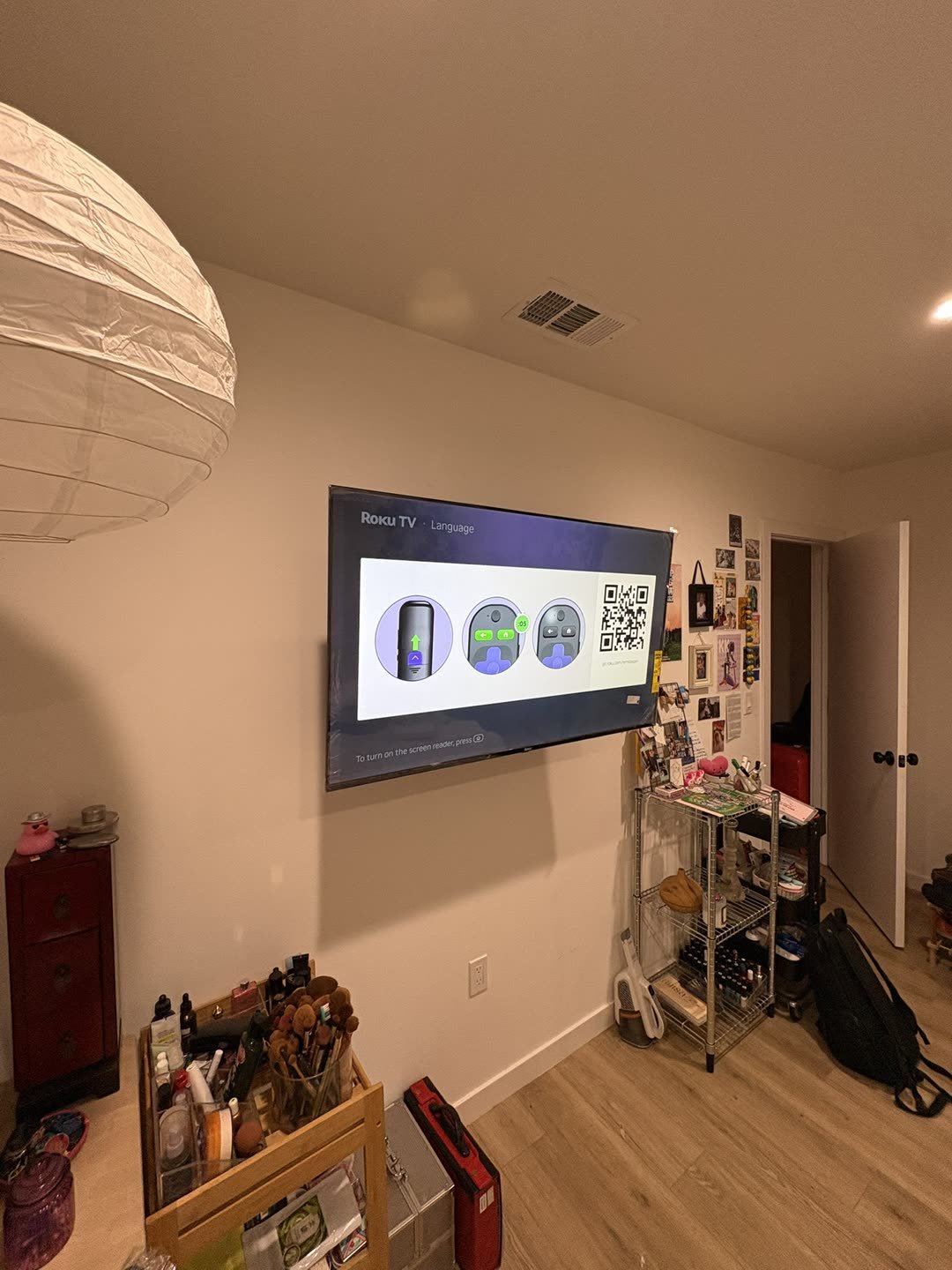 Roku TV mounted in cozy living room