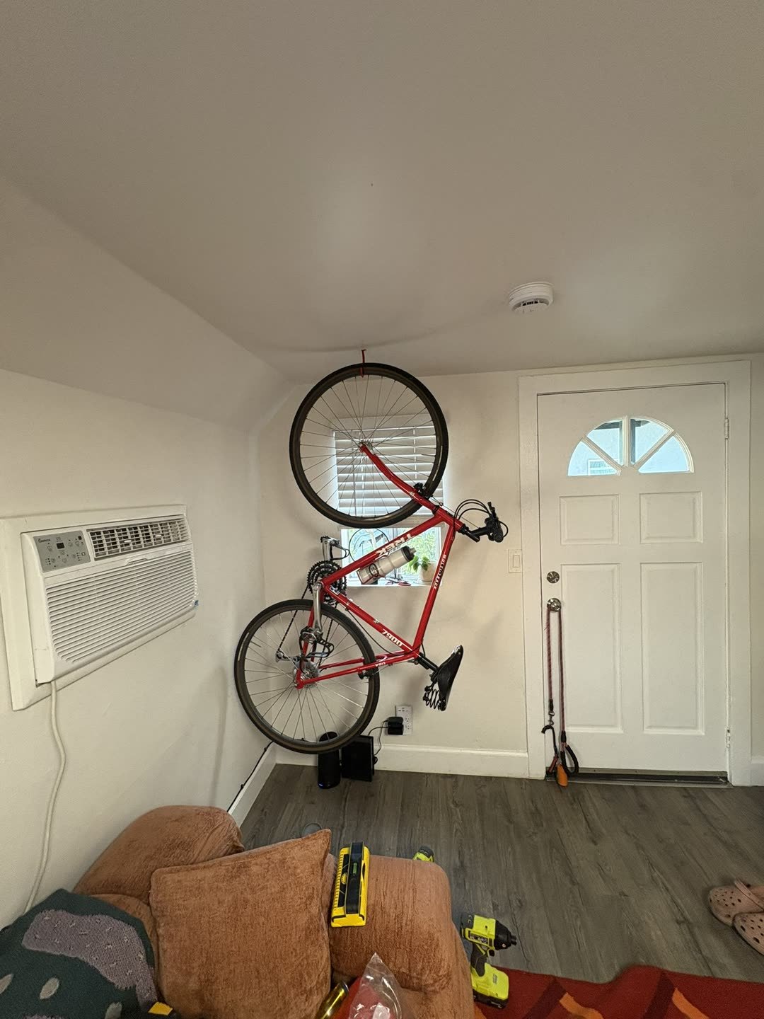 Bike mounted vertically on wall