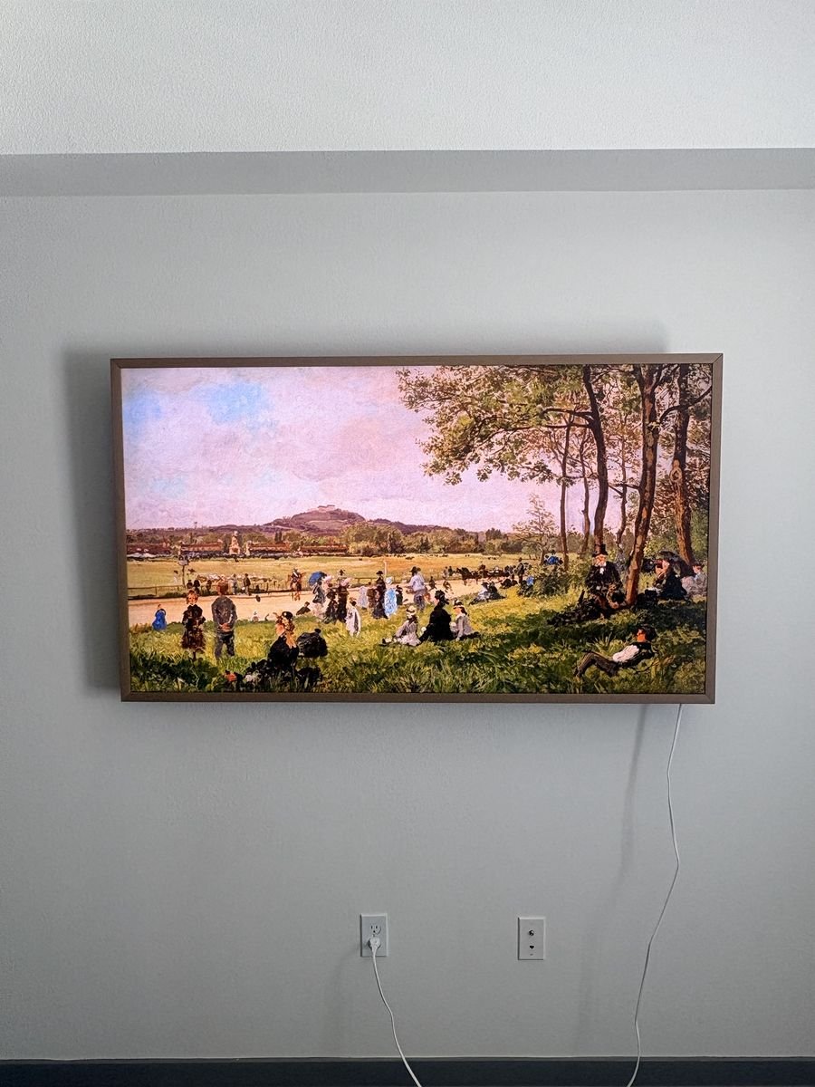 Samsung Frame TV mounted flush to the wall like a picture frame